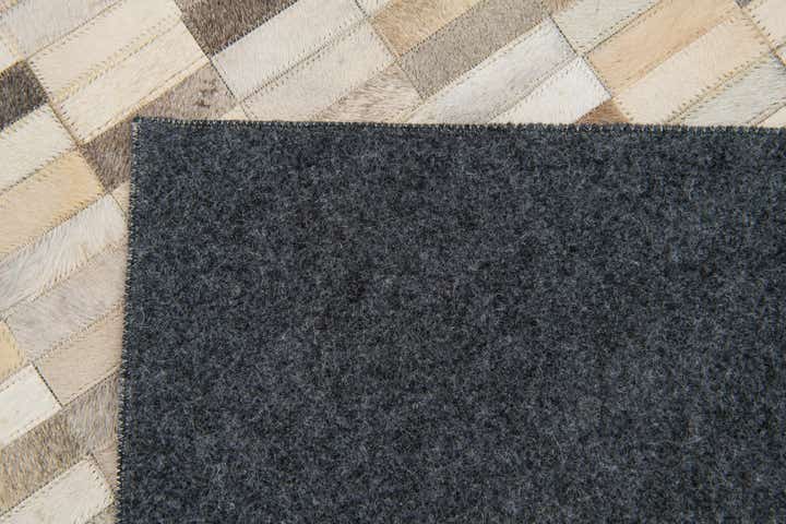 5' 1 x 7' 11 Cowhide Stocks Rug