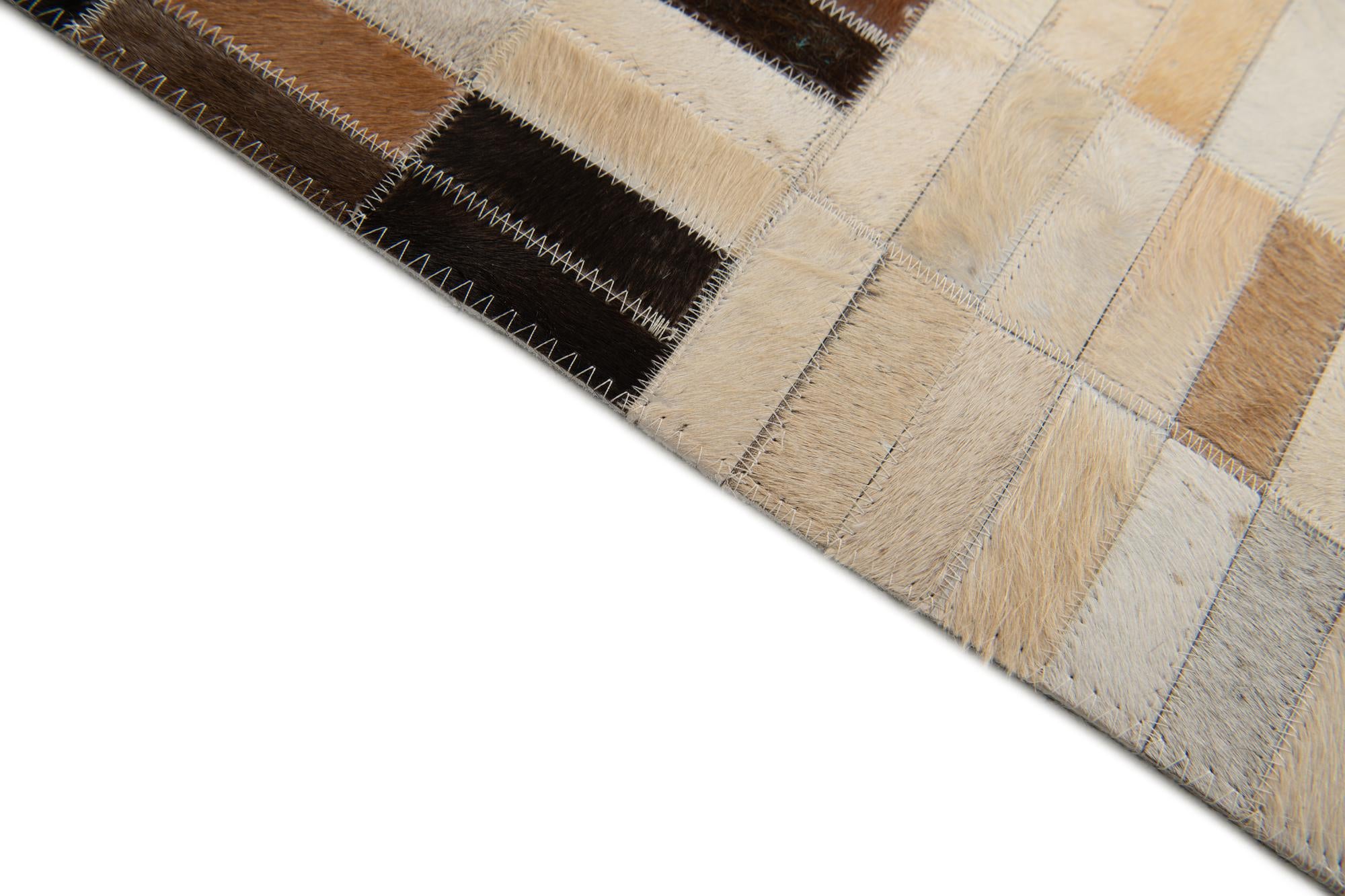 5' x 7' 11 Cowhide Stocks Rug