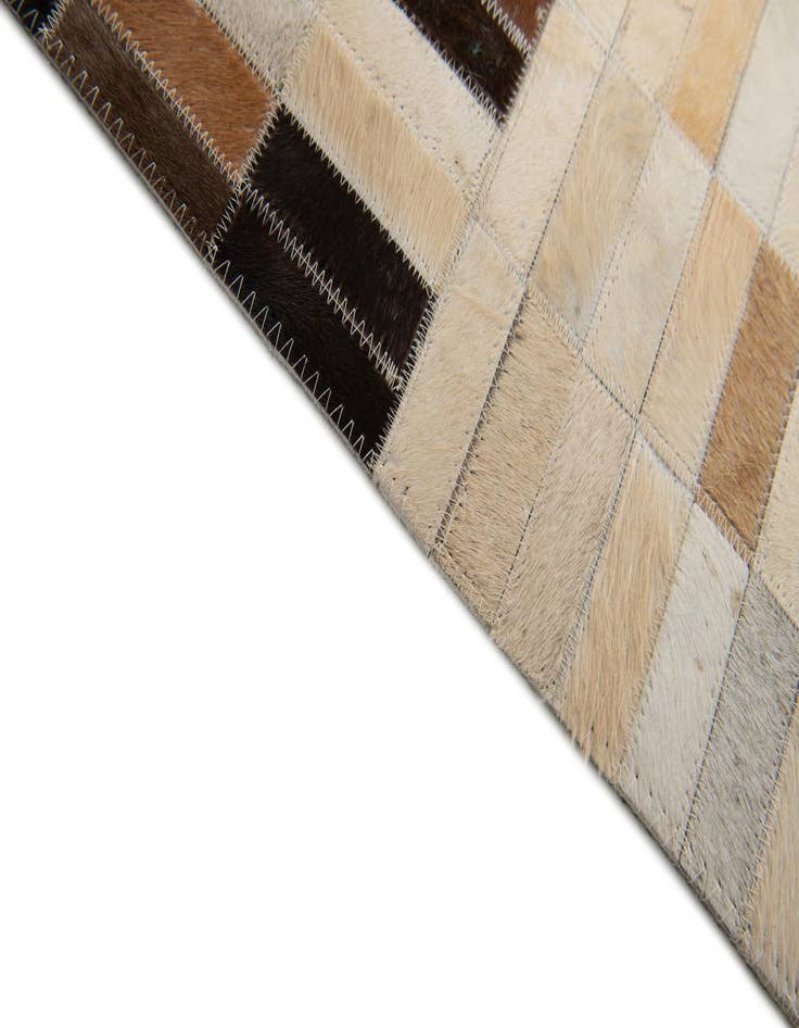 Detail image of 5' x 7' 11 Cowhide Stocks Rug