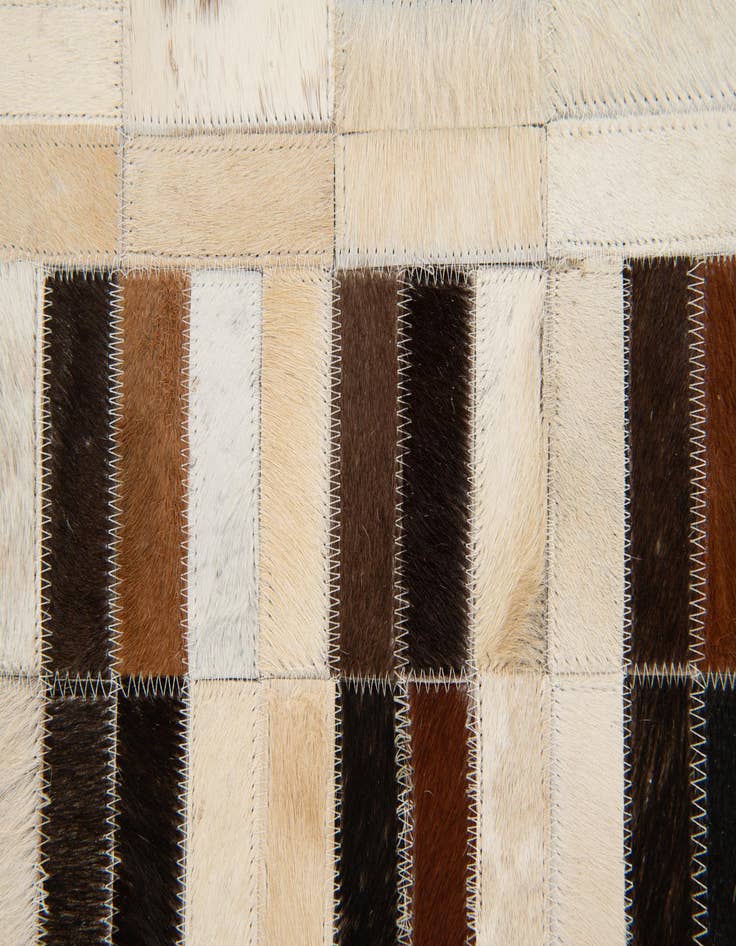 Detail image of 5' x 7' 11 Cowhide Stocks Rug