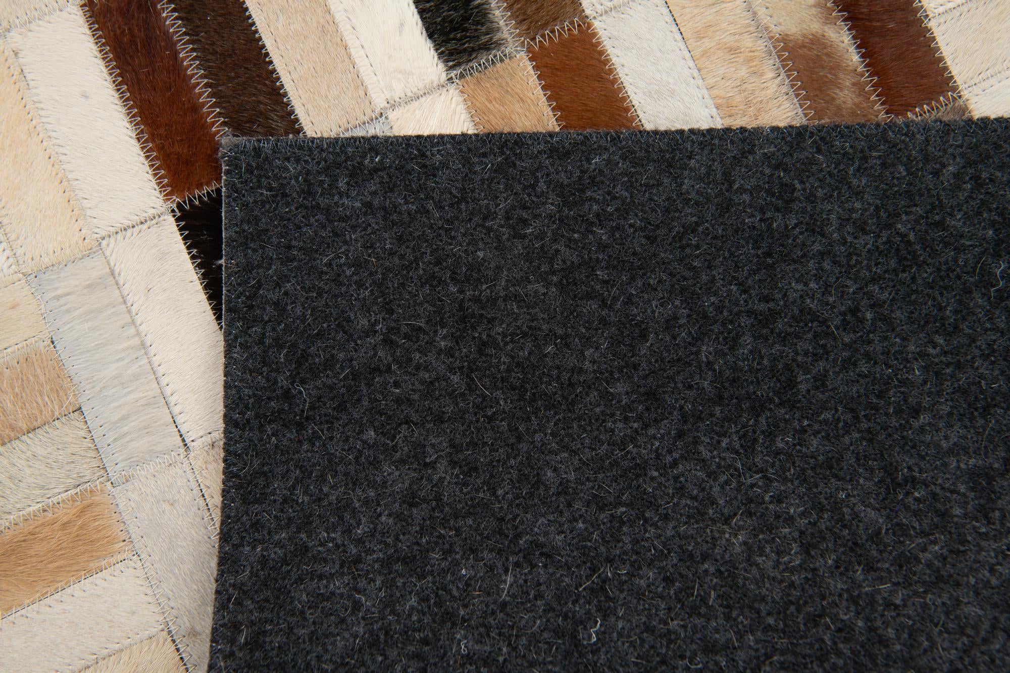 5' x 7' 11 Cowhide Stocks Rug