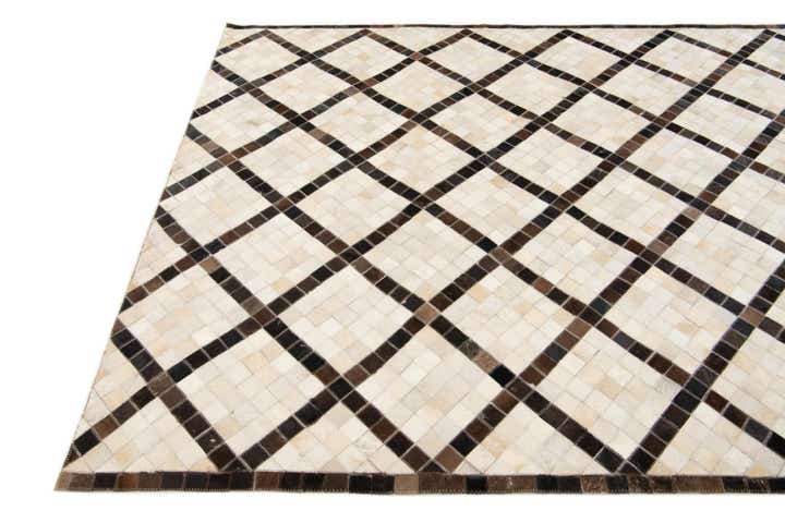 5' 2 x 8' Cowhide Stocks Rug