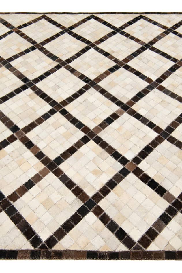 Detail image of 5' 2 x 8' Cowhide Stocks Rug