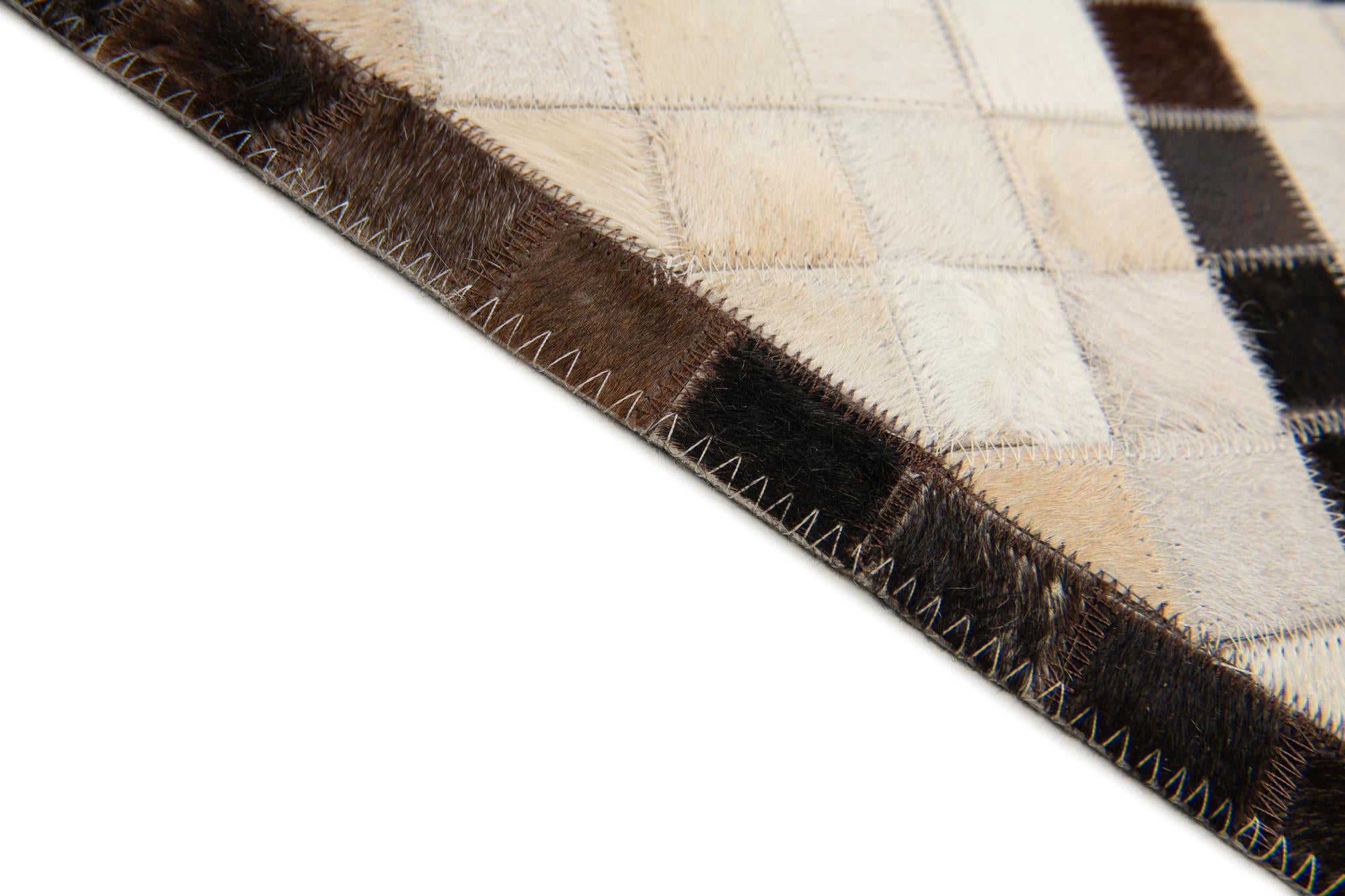 5' 2 x 8' Cowhide Stocks Rug