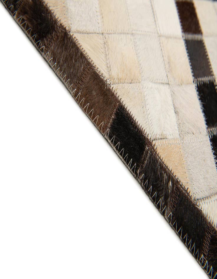 Detail image of 5' 2 x 8' Cowhide Stocks Rug