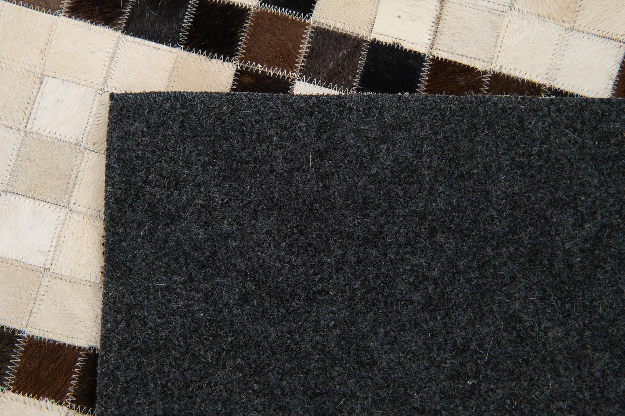 5' 2 x 8' Cowhide Stocks Rug