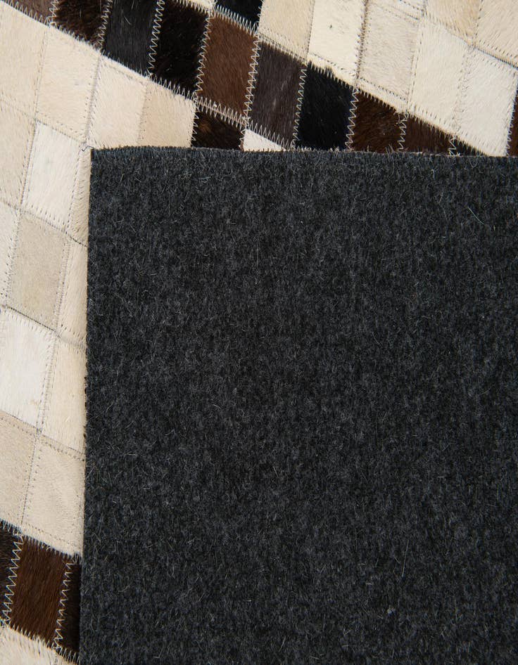 Detail image of 5' 2 x 8' Cowhide Stocks Rug