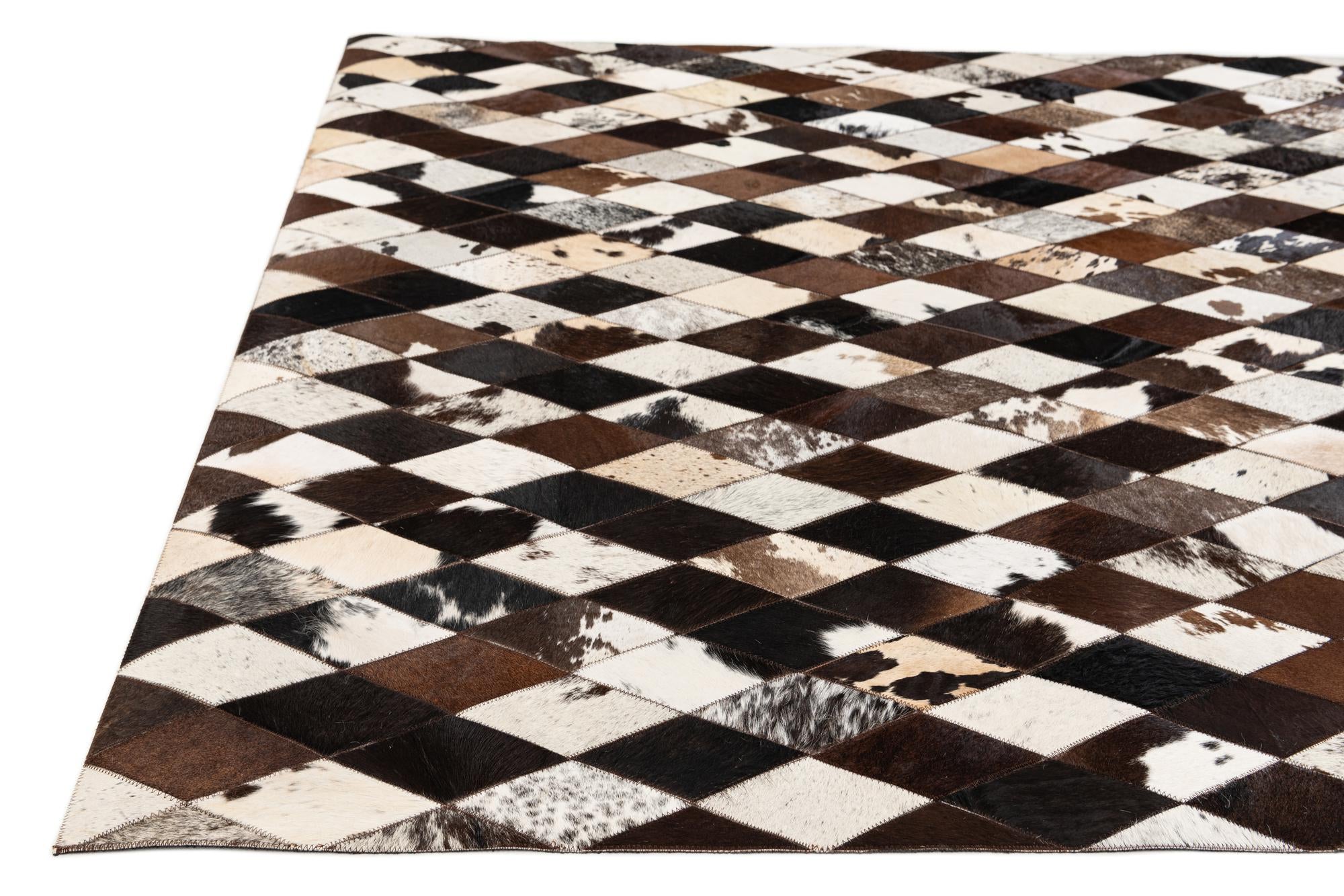5' 2 x 8' 1 Cowhide Stocks Rug