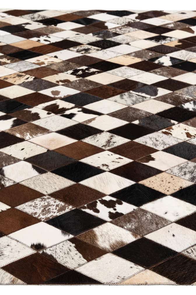 5' 2 x 8' 1 Cowhide Stocks Rug