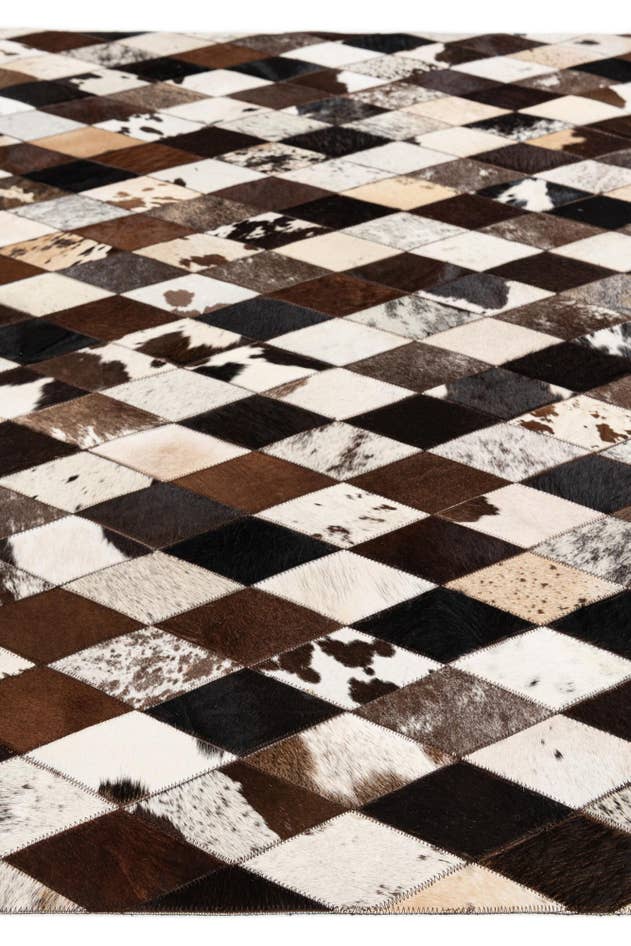 Detail image of 5' 2 x 8' 1 Cowhide Stocks Rug