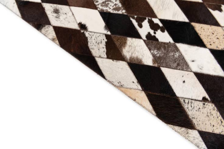 Detail image of 5' 2 x 8' 1 Cowhide Stocks Rug