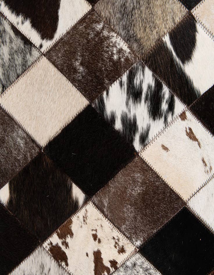 Detail image of 5' 2 x 8' 1 Cowhide Stocks Rug