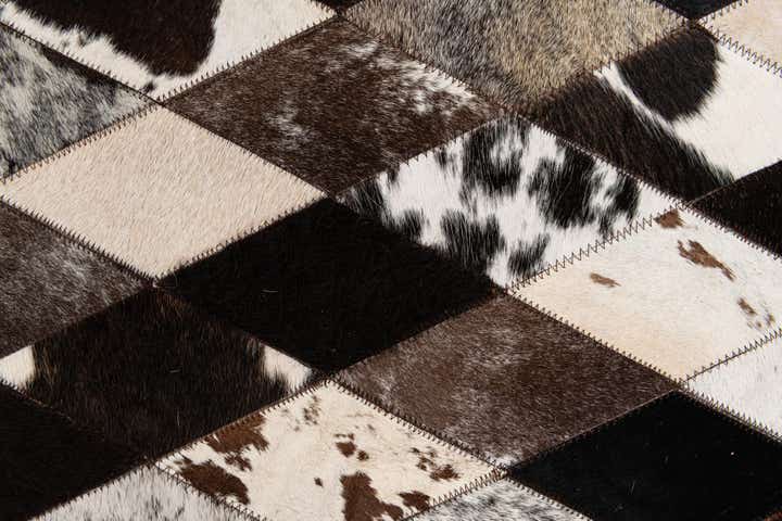 5' 2 x 8' 1 Cowhide Stocks Rug