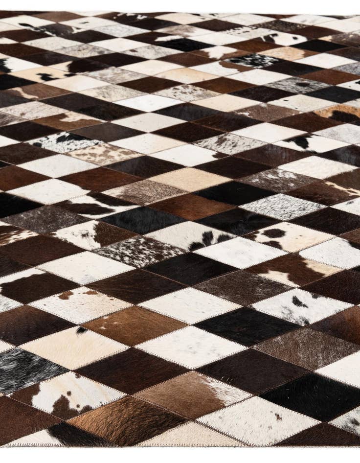 Detail image of 5' 2 x 8' 1 Cowhide Stocks Rug