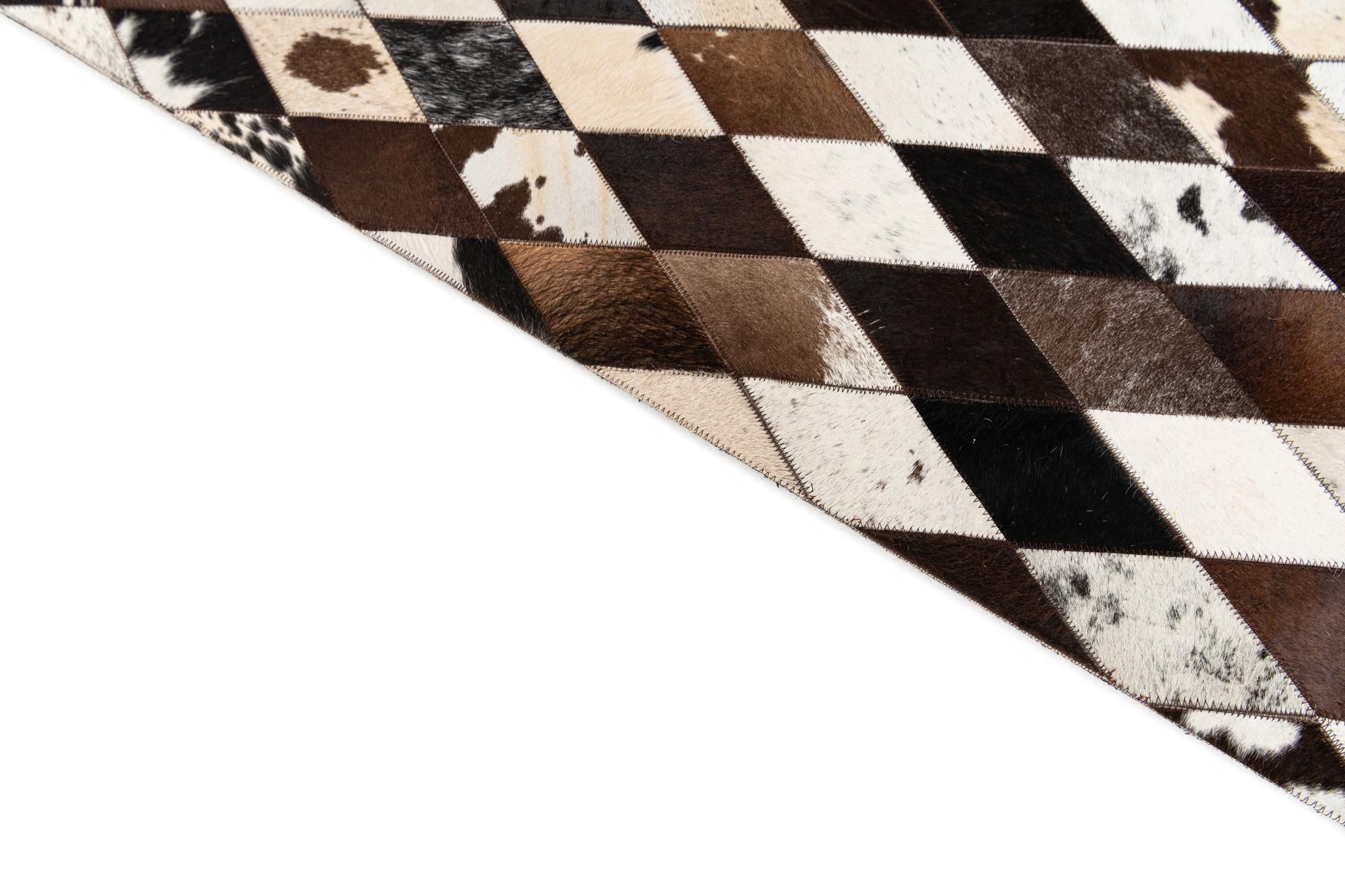5' 2 x 8' 1 Cowhide Stocks Rug