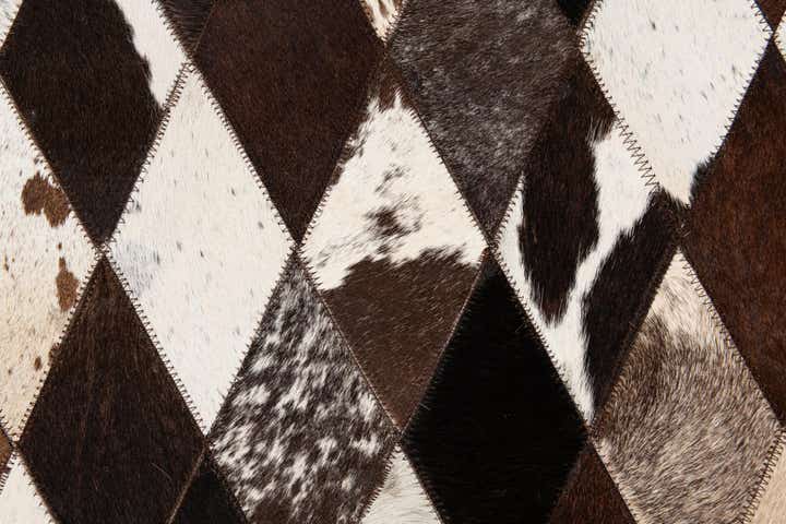 5' 2 x 8' 1 Cowhide Stocks Rug