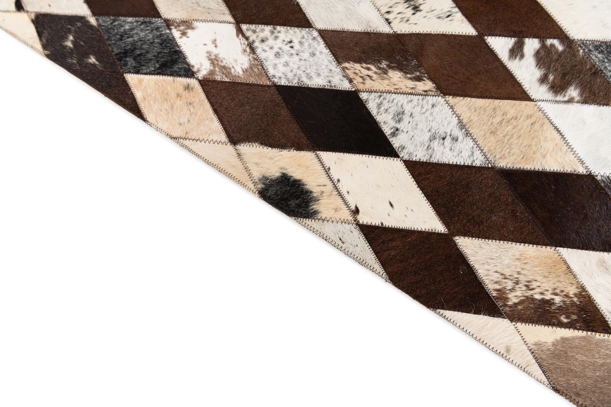 5' 2 x 8' 1 Cowhide Stocks Rug