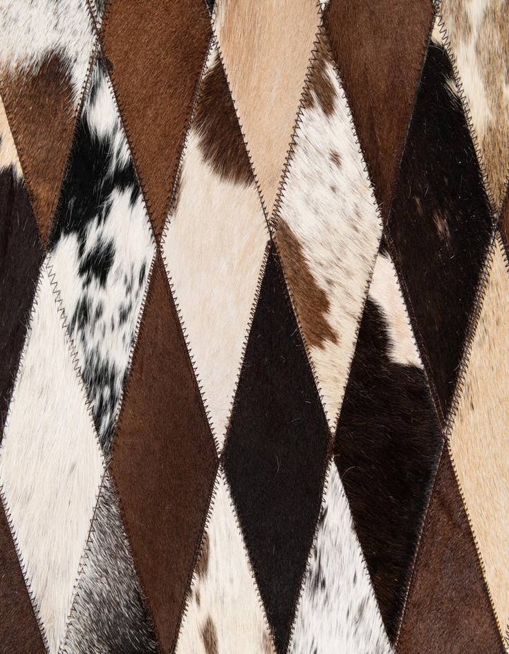 Detail image of 5' 2 x 8' 1 Cowhide Stocks Rug