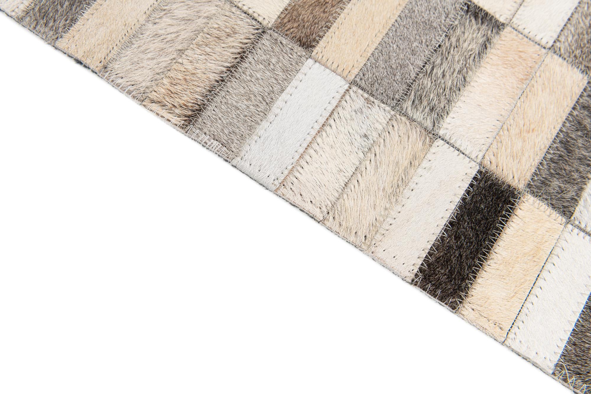 5' 1 x 8' Cowhide Stocks Rug