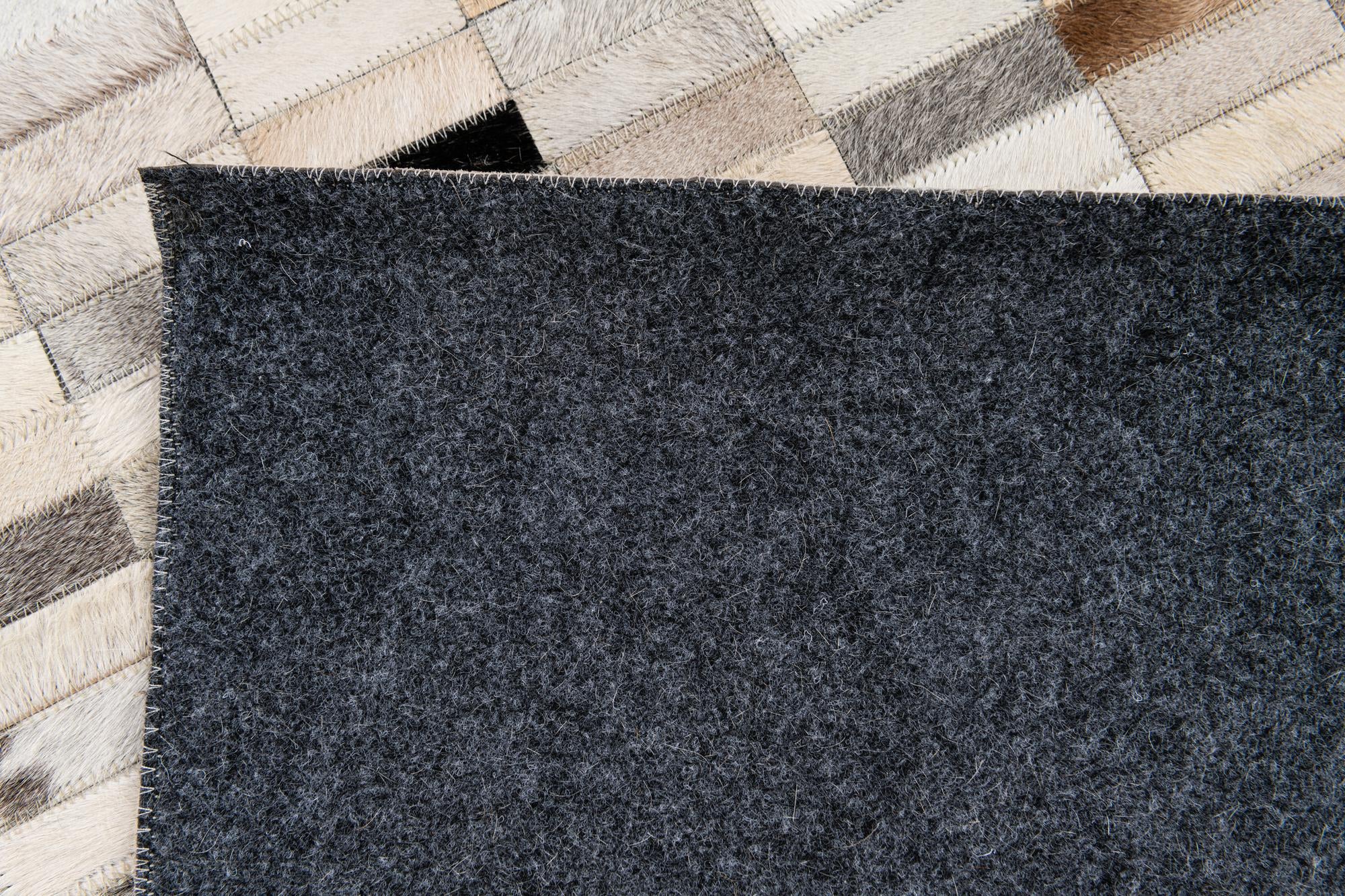 5' 1 x 8' Cowhide Stocks Rug
