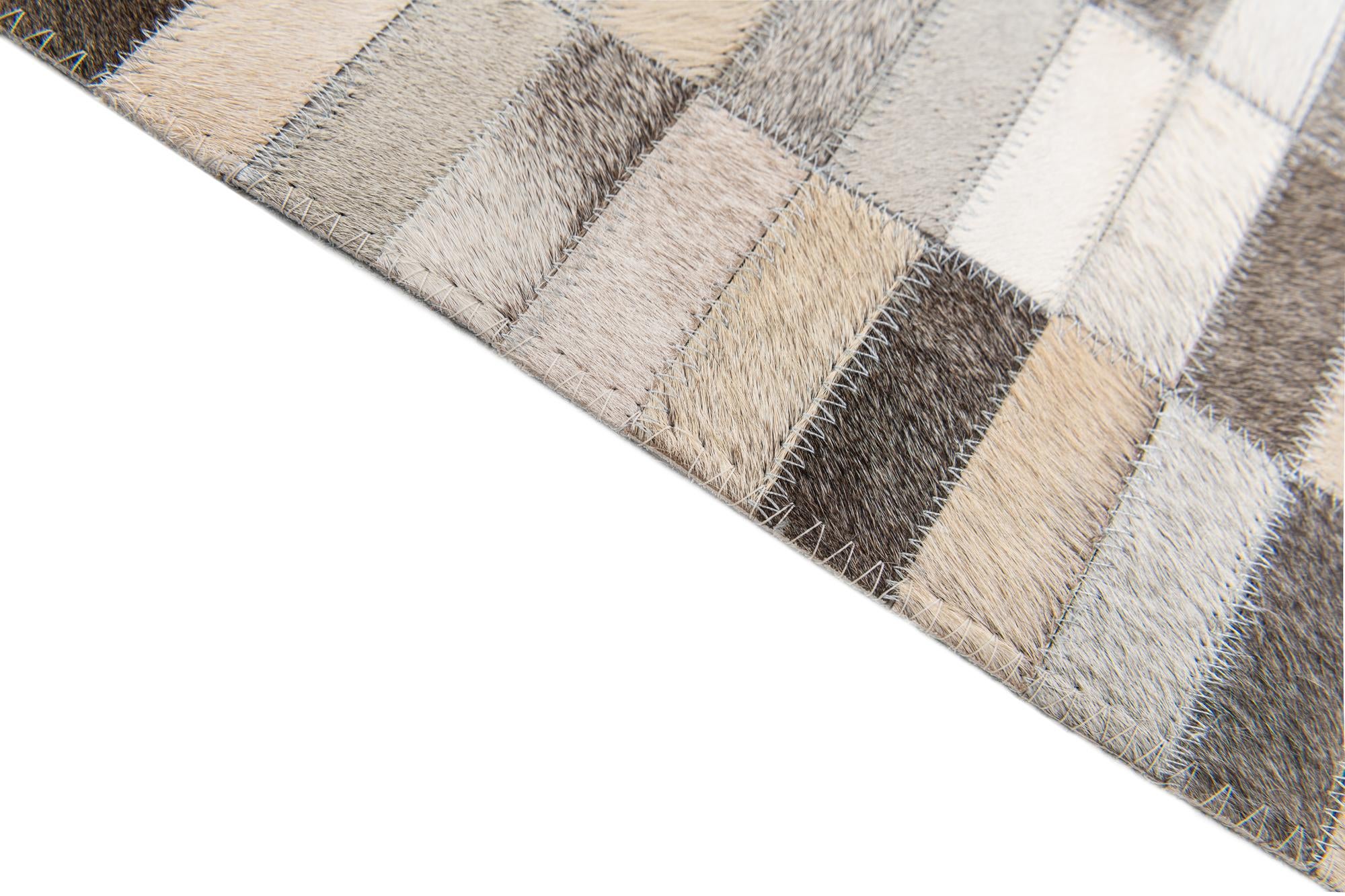 5' x 8' Cowhide Stocks Rug