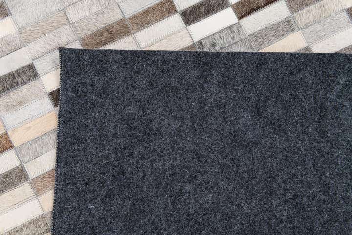 5' x 8' Cowhide Stocks Rug