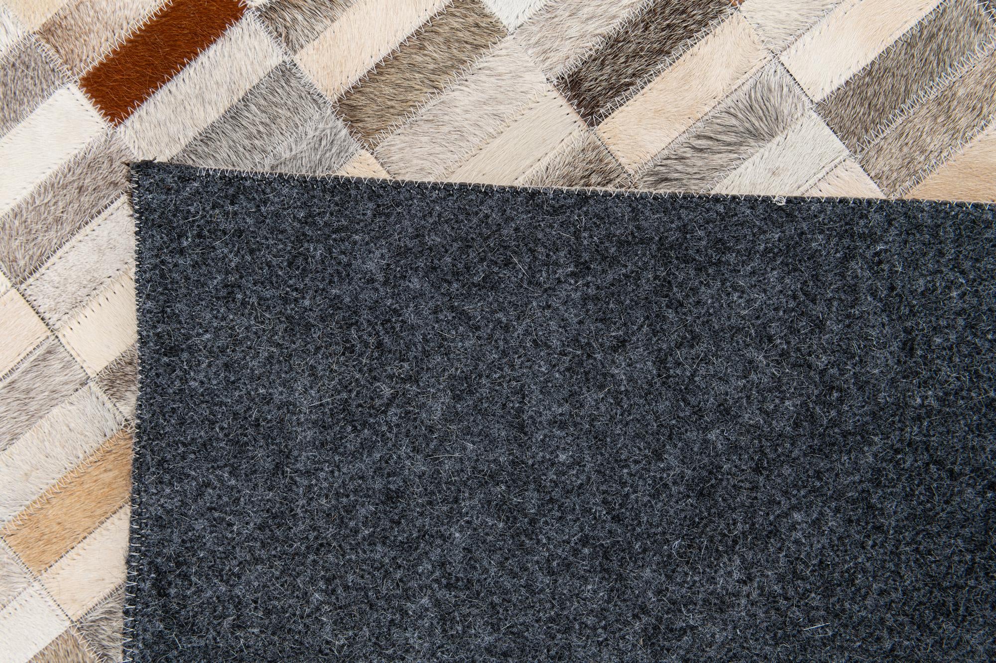 5' 1 x 8' Cowhide Stocks Rug