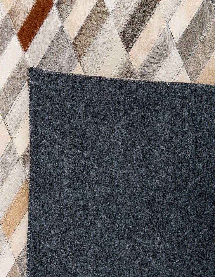 Detail image of 5' 1 x 8' Cowhide Stocks Rug