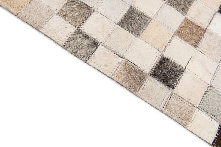 Detail image of 5' x 7' 11 Cowhide Stocks Rug