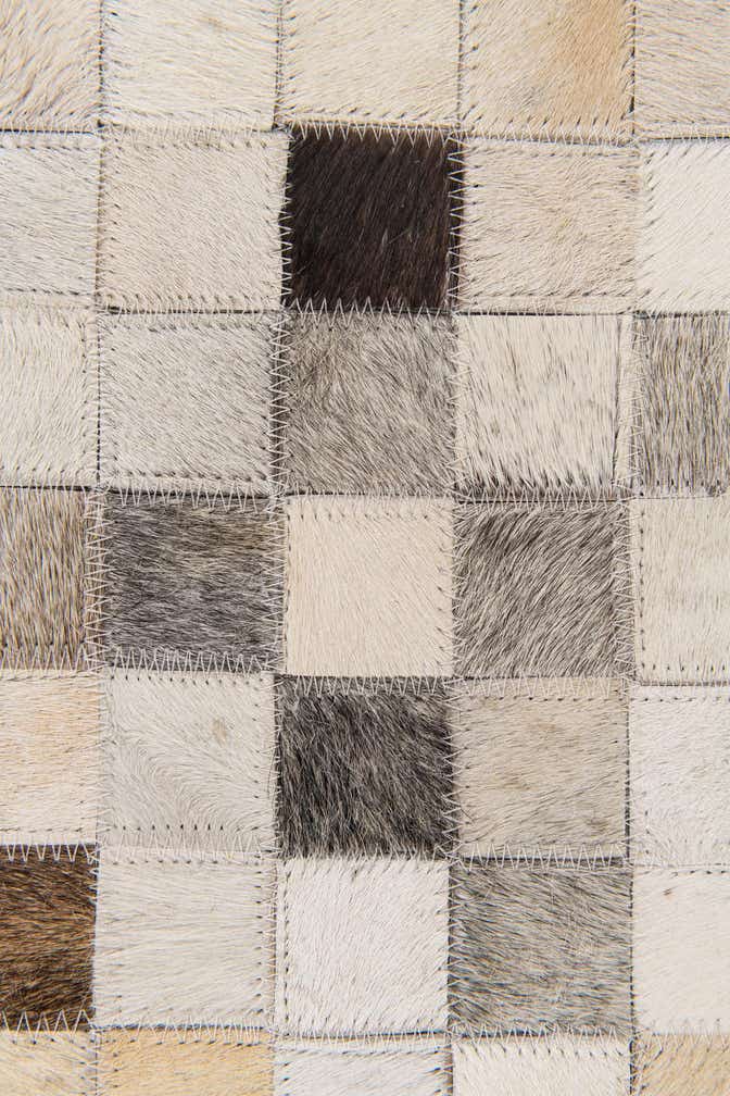 5' x 7' 11 Cowhide Stocks Rug