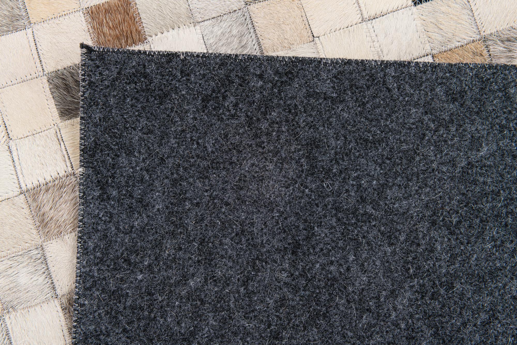 5' x 7' 11 Cowhide Stocks Rug