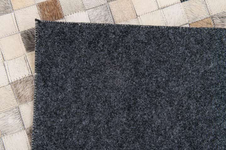 5' x 7' 11 Cowhide Stocks Rug