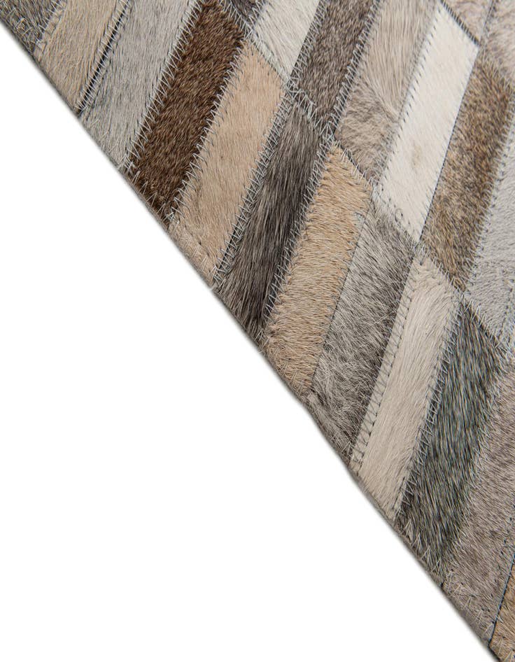 Detail image of 5' 3 x 8' Cowhide Stocks Rug
