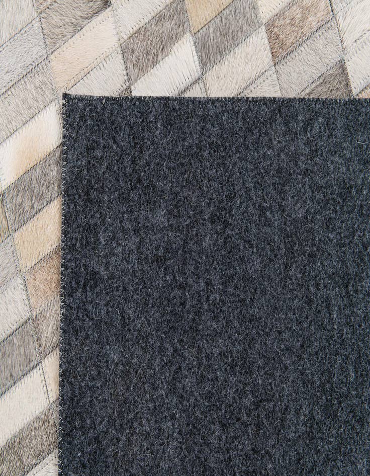 Detail image of 5' 3 x 8' Cowhide Stocks Rug