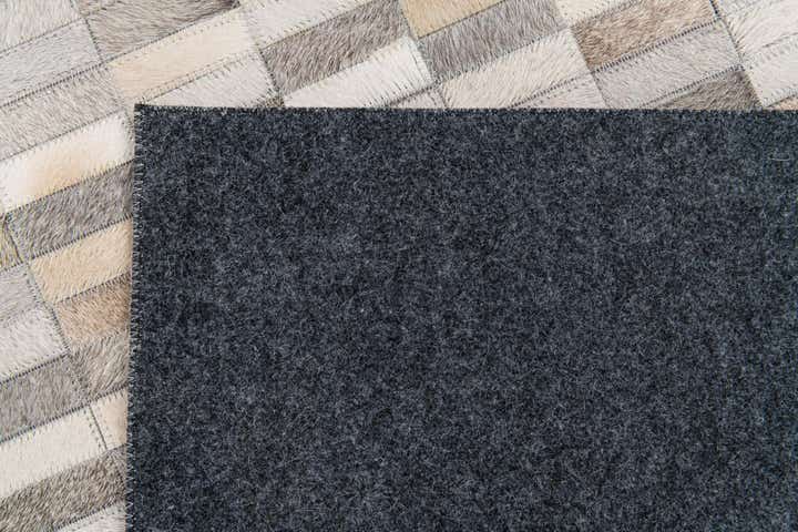 5' 3 x 8' Cowhide Stocks Rug