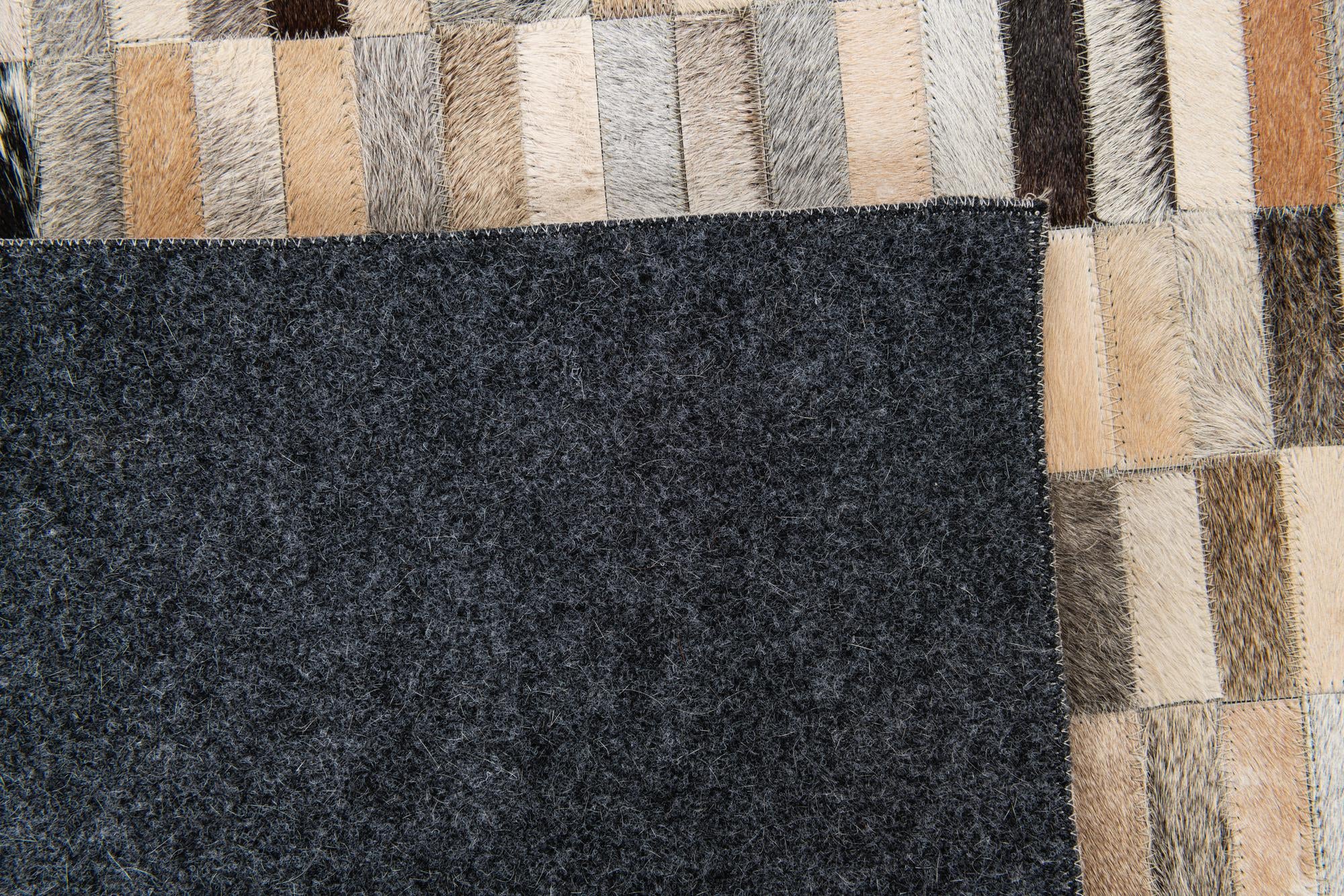 5' 1 x 7' 11 Cowhide Stocks Rug