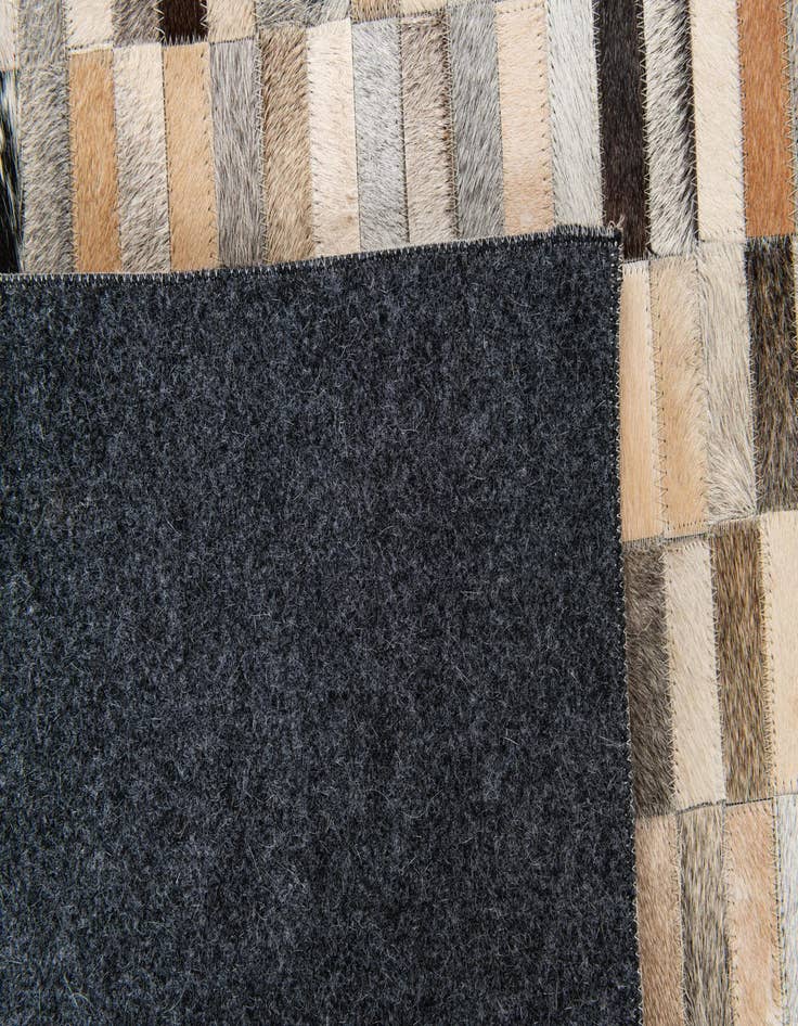 Detail image of 5' 1 x 7' 11 Cowhide Stocks Rug