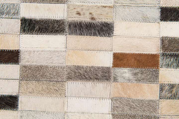 5' 1 x 7' 10 Cowhide Stocks Rug