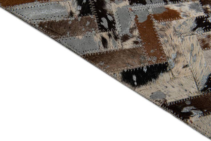 Detail image of 4' 10 x 7' 7 Cowhide Stocks Rug