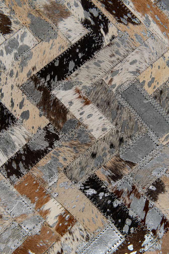 4' 10 x 7' 7 Cowhide Stocks Rug
