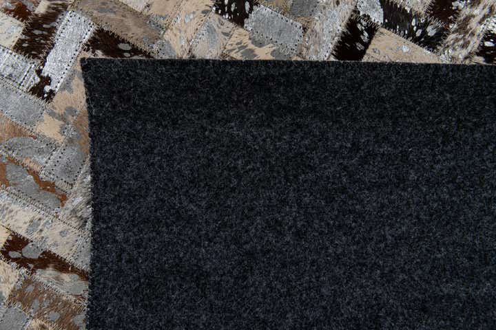 4' 10 x 7' 7 Cowhide Stocks Rug