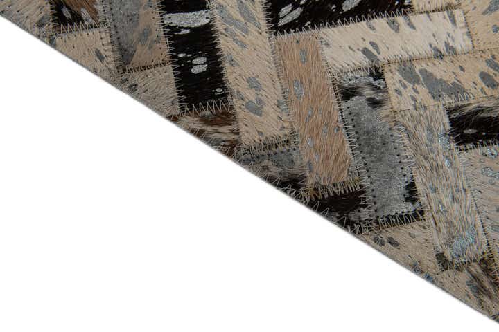 5' x 7' 7 Cowhide Stocks Rug