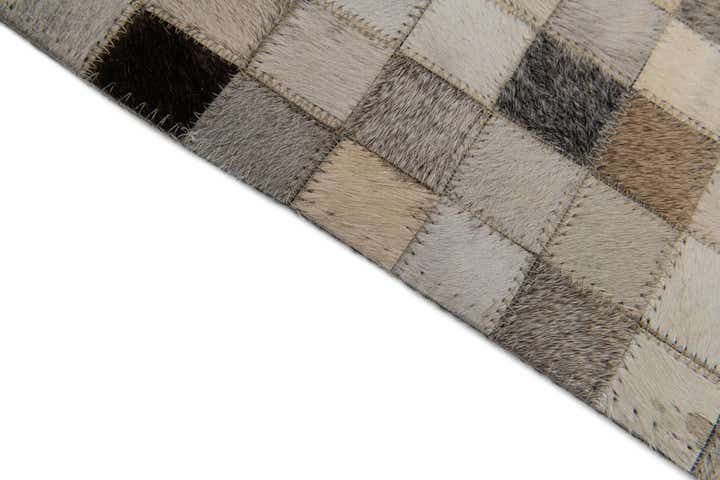 5' x 8' Cowhide Stocks Rug