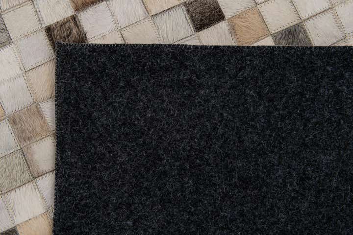 5' x 8' Cowhide Stocks Rug