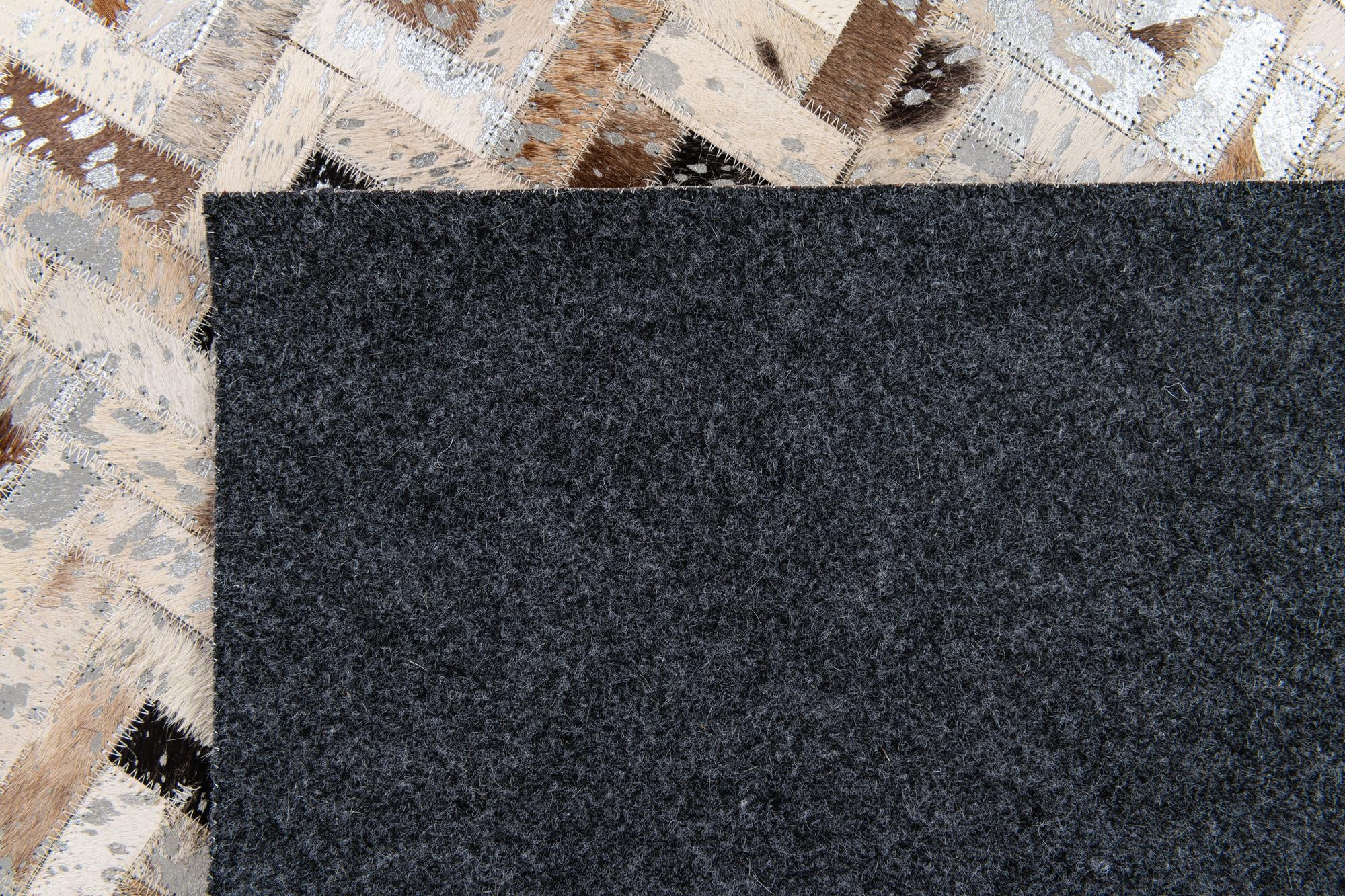 4' 10 x 7' 6 Cowhide Stocks Rug