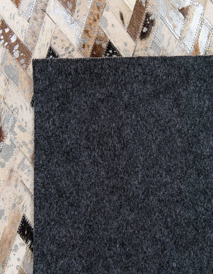Detail image of 4' 10 x 7' 6 Cowhide Stocks Rug