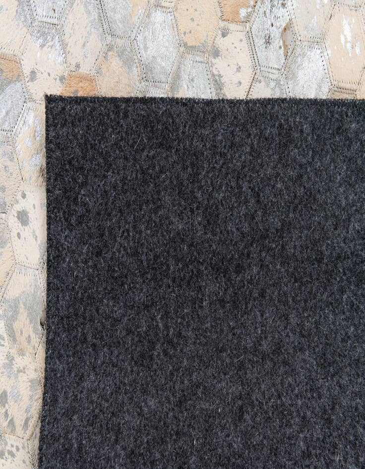Detail image of 4' 11 x 7' 8 Cowhide Stocks Rug