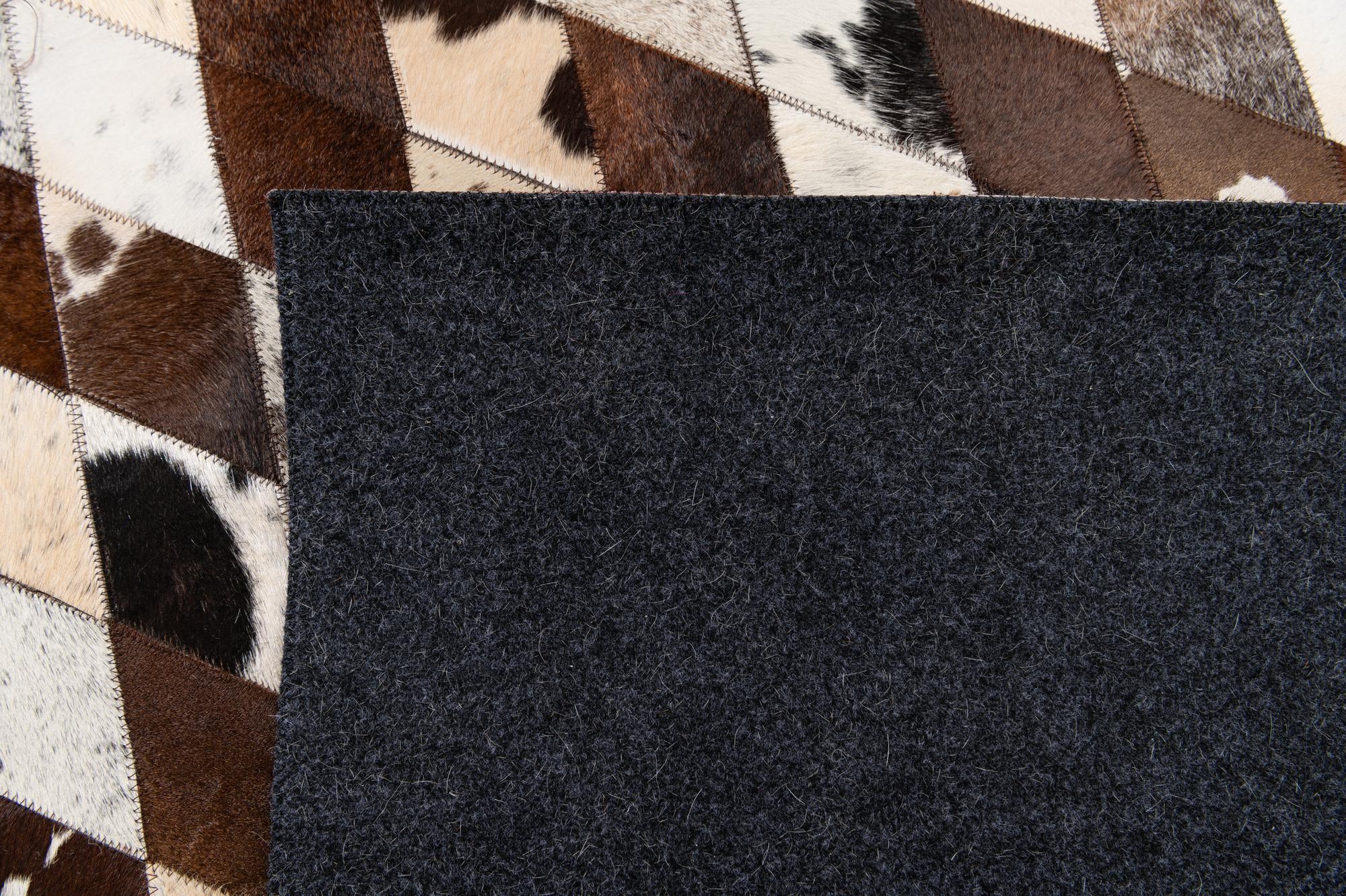 6' 6 x 9' 10 Cowhide Stocks Rug