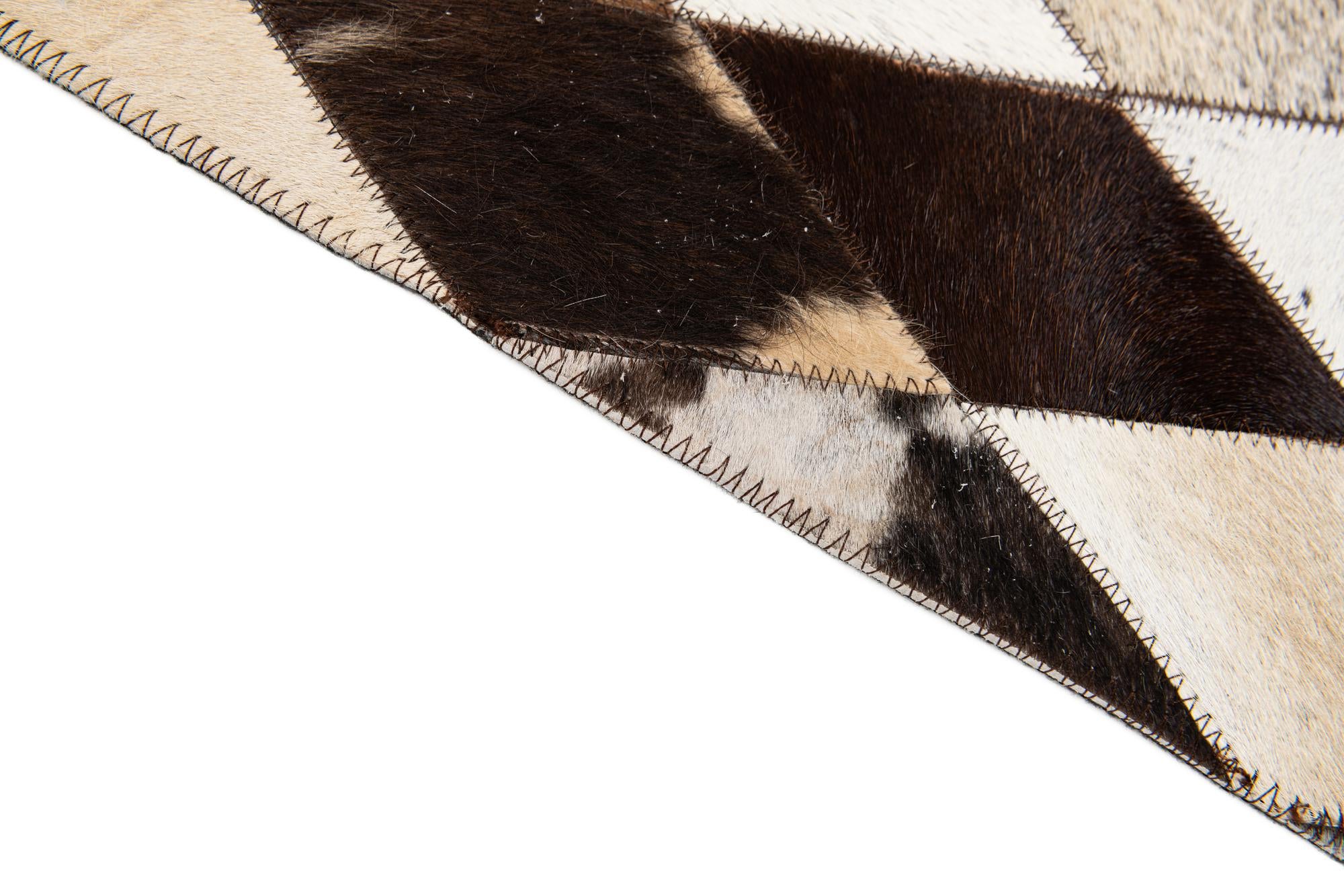 6' 6 x 9' 10 Cowhide Stocks Rug