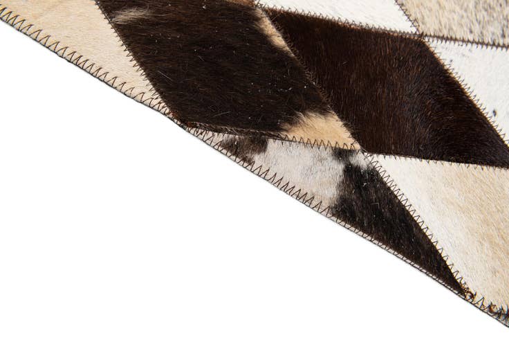 Detail image of 6' 6 x 9' 10 Cowhide Stocks Rug